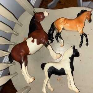 Breyer Brown, Tan, and Black & White Horse Figurines